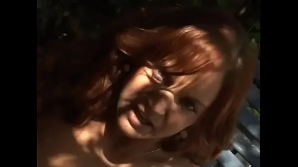 Caliente Playful redhaired hottie Gabriella Banks took off her lingerie to play with her muff rubbing it with glass dildo in the shade of a tree tubo total